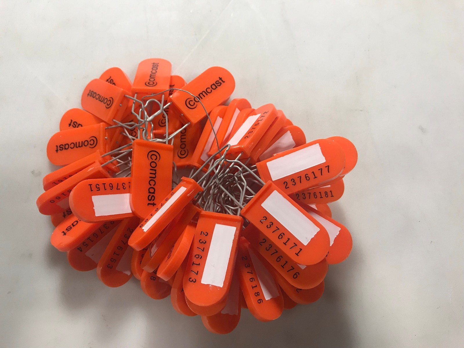 Comcast Security Tag 2376001 Bundles of 25 Orange