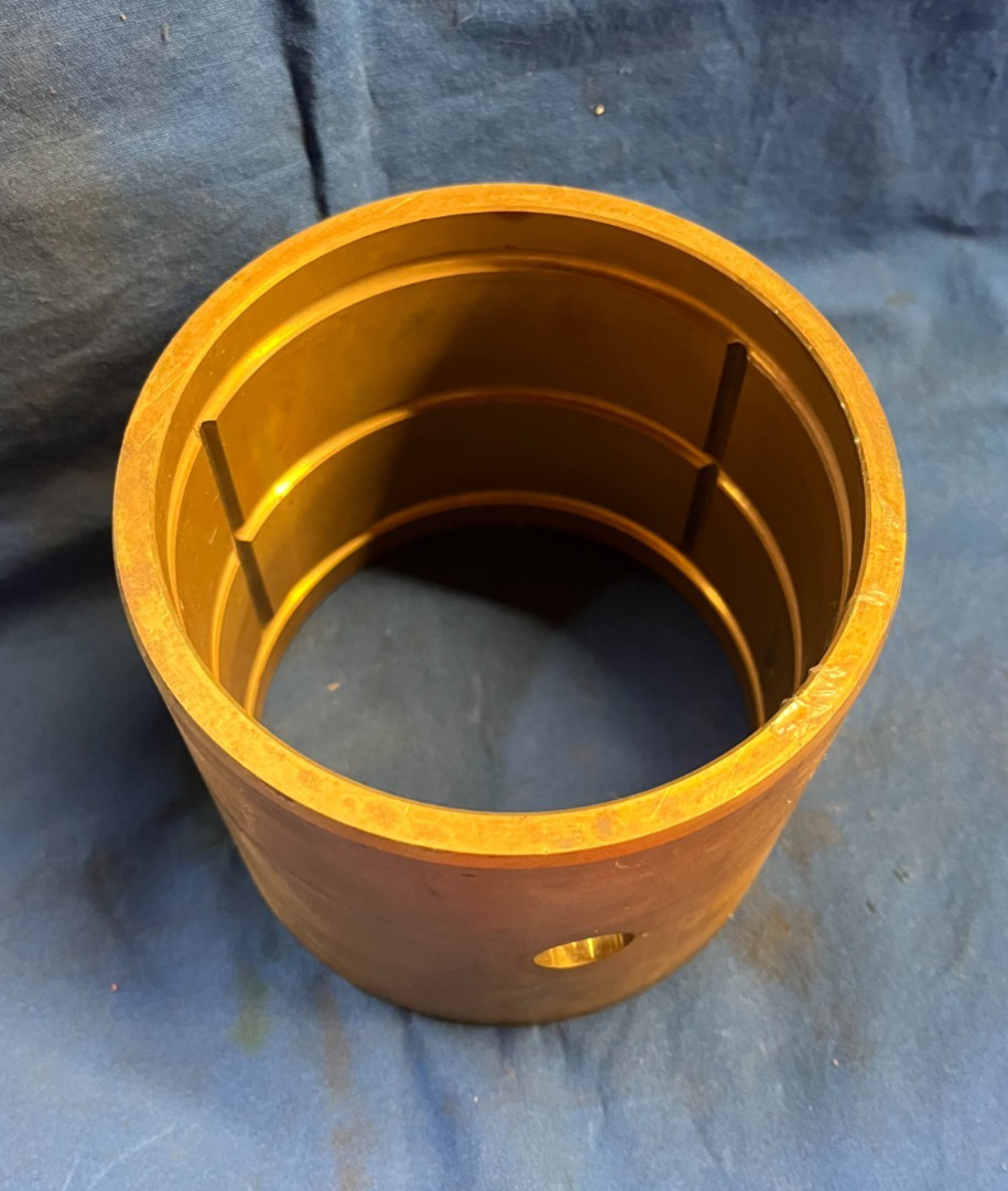 BRONZE BUSHING WITH OIL GROOVES O.D. 4-1/2″ I.D. 3-7/8″ 101332, HOLE 5/8″ DIA.